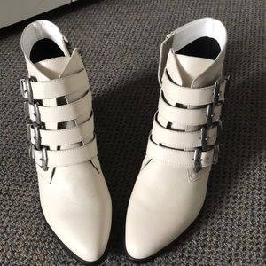 Never worn Steve Madden buckle boots